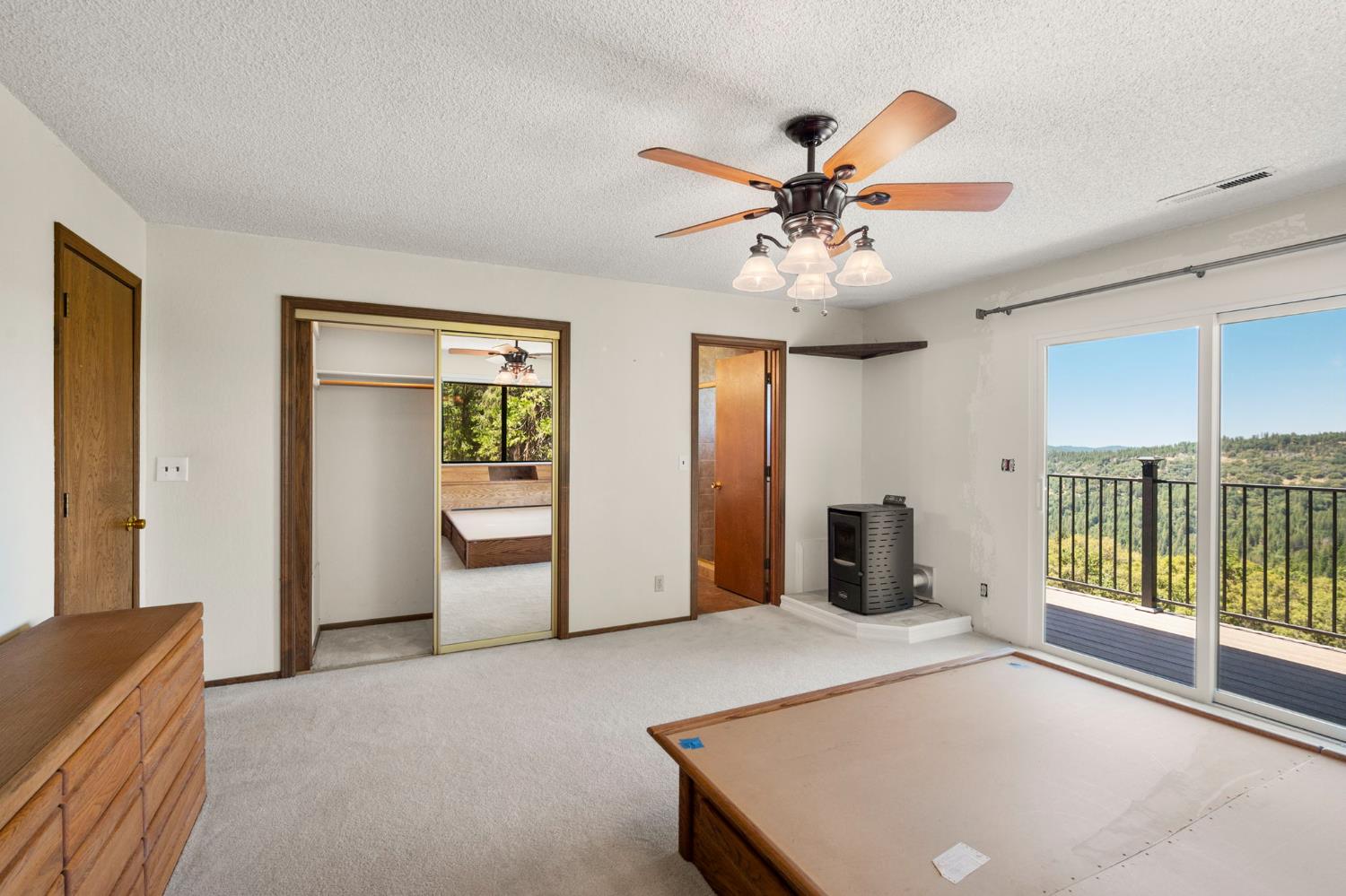 24835 Shake Ridge Road Volcano, CA 95689 - Photo 32 of 79 a living room with furniture and a large window
