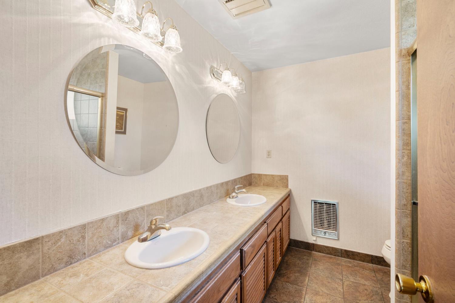 24835 Shake Ridge Road Volcano, CA 95689 - Photo 33 of 79 a bathroom with a sink and a mirror