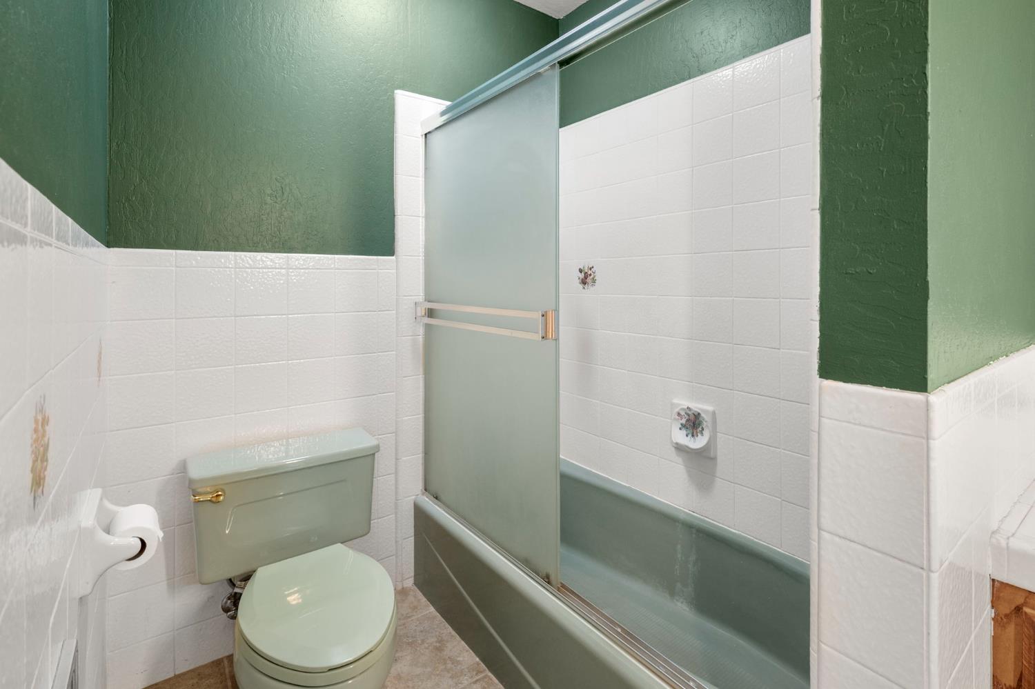 24835 Shake Ridge Road Volcano, CA 95689 - Photo 38 of 79 a bathroom with a toilet and a shower