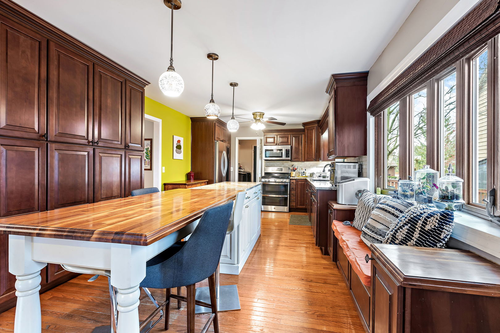 2660 Sun Valley Road Lisle, IL 60532 - Photo 6 of 27 a large kitchen with granite countertop a large island in the center