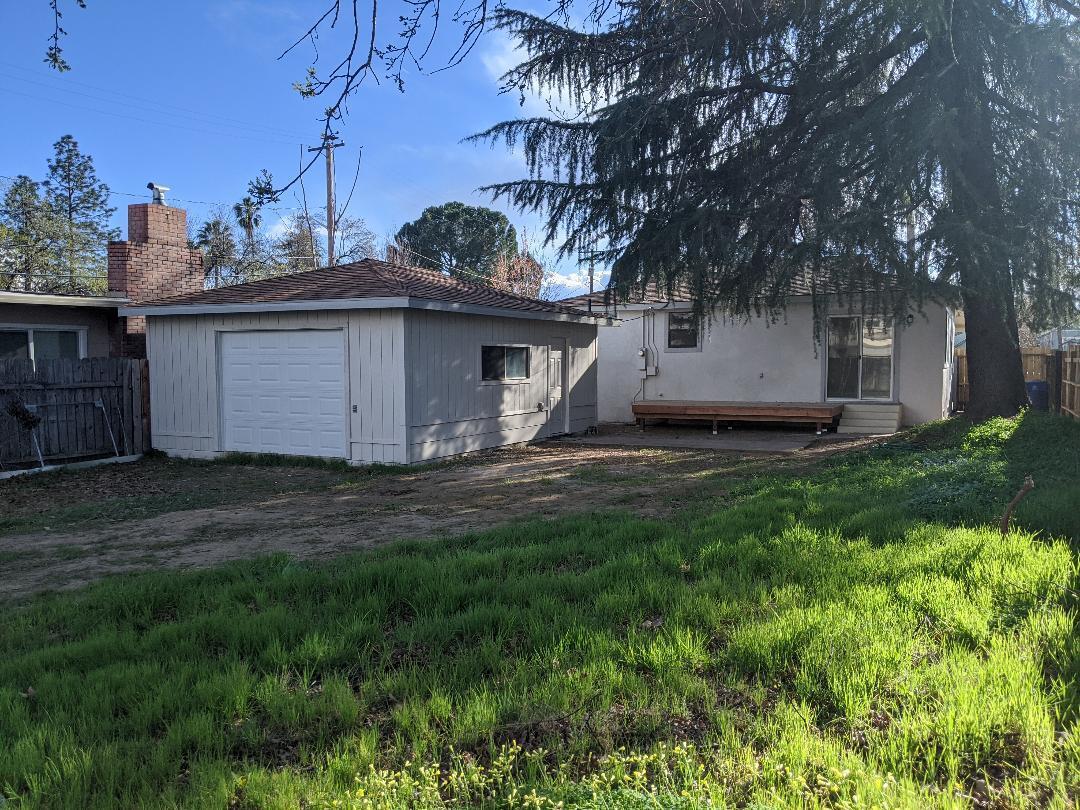 1012 State Street Redding, CA 96001 - Photo 22 of 23 a view of a house with a yard