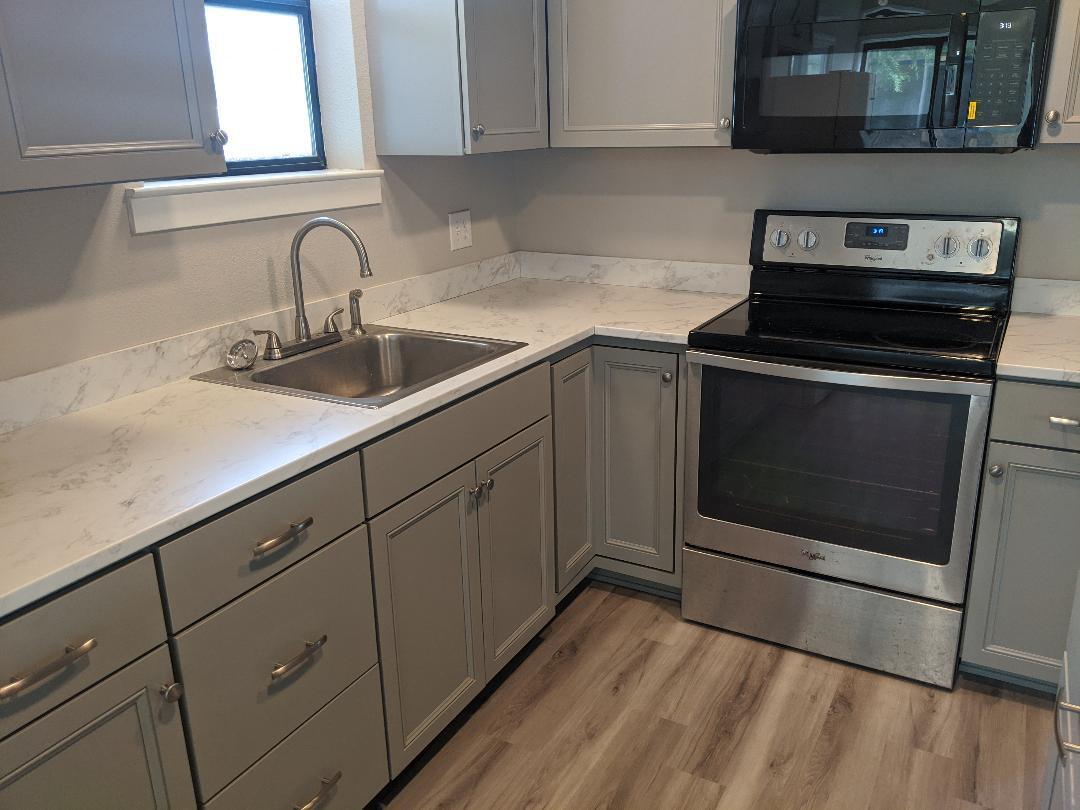 1012 State Street Redding, CA 96001 - Photo 9 of 23 a kitchen with sink and cabinets