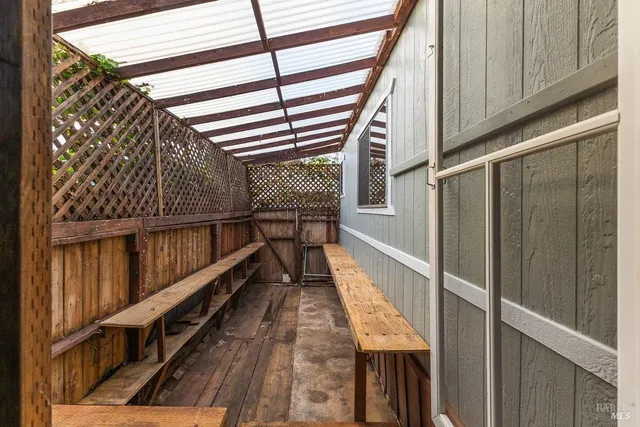 a view of a swimming pool with an outdoor seating