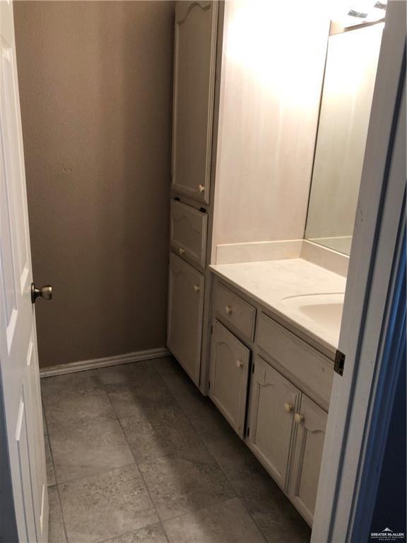 1900 Summer Breeze Street Mission, TX 78572 - Photo 9 of 9 Bathroom featuring vanity and baseboards
