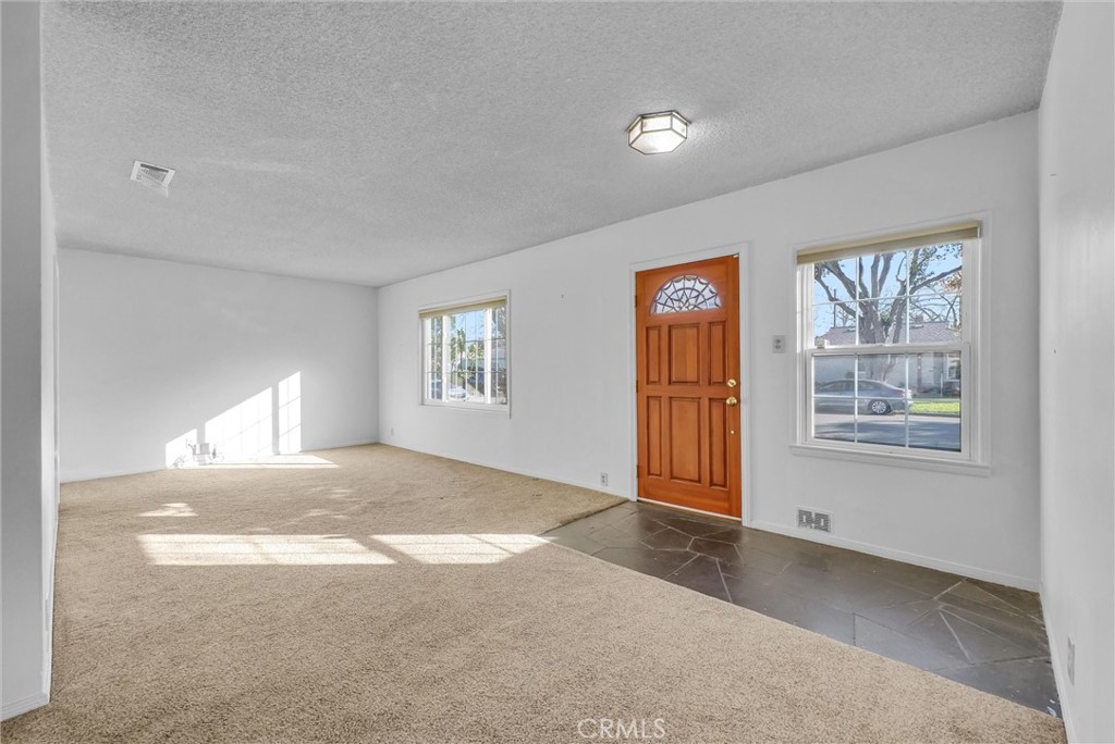 4741 Hazelbrook Avenue Long Beach, CA 90808 - Photo 2 of 22 a view of an empty room with a window