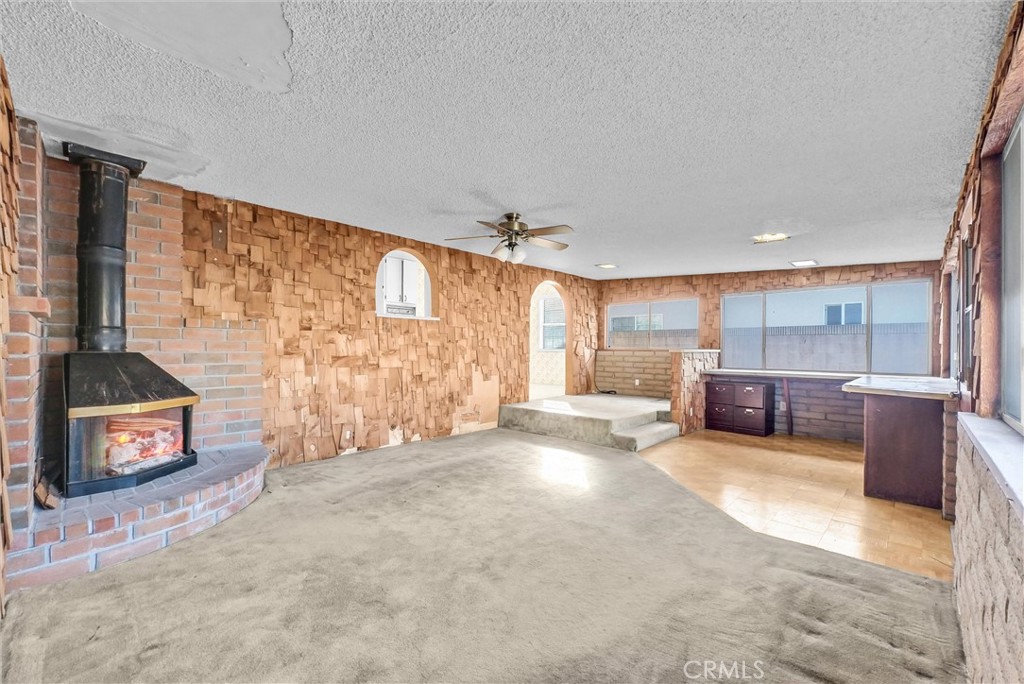 4741 Hazelbrook Avenue Long Beach, CA 90808 - Photo 5 of 22 a living room with furniture and a flat screen tv