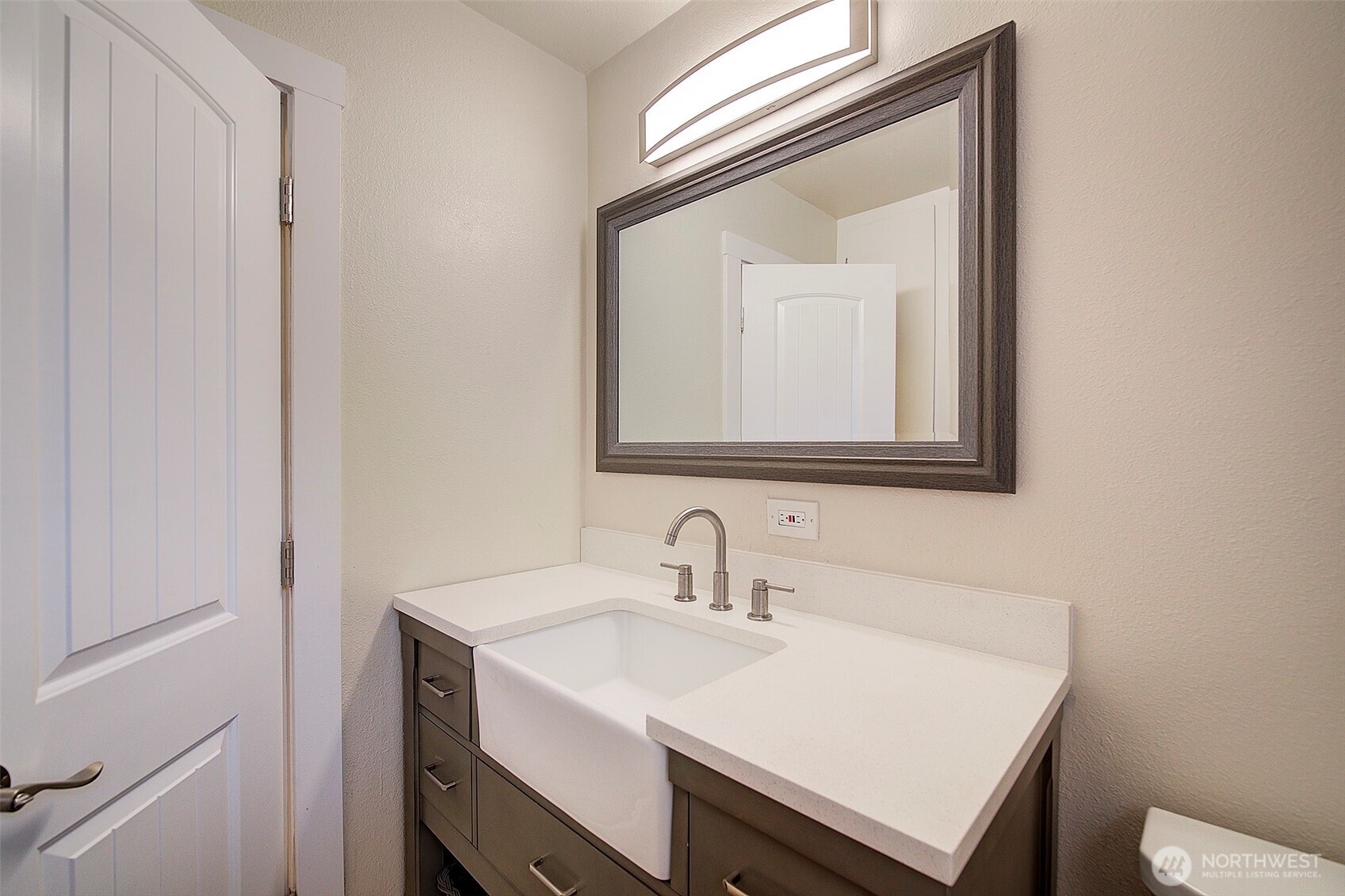 31612 8th Avenue South Roy, WA 98580 - Photo 25 of 40 a bathroom with a sink vanity and a mirror
