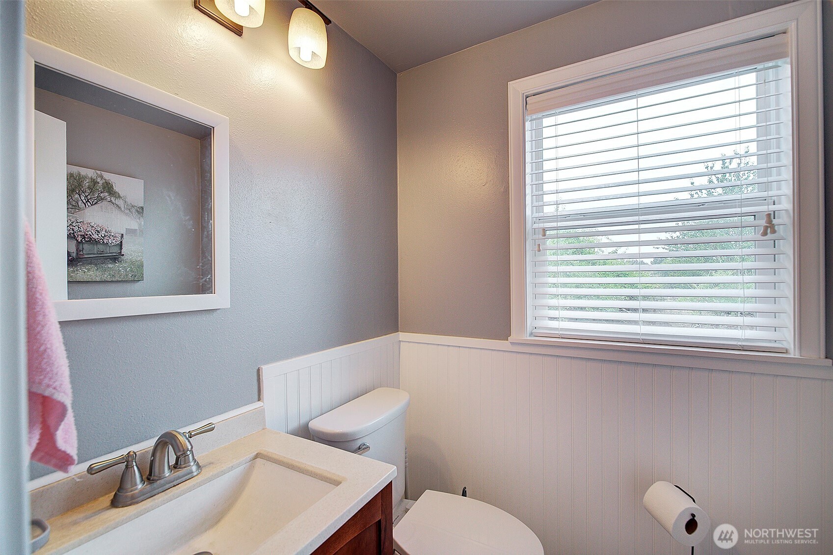 31612 8th Avenue South Roy, WA 98580 - Photo 27 of 40 a bathroom with a toilet sink and mirror