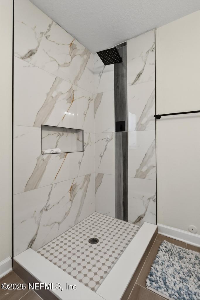 433 Lena Street St. Augustine, FL 32084 - Photo 27 of 42 a bathroom with a shower