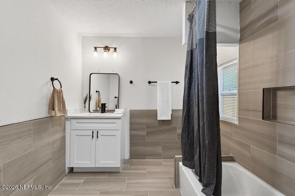 433 Lena Street St. Augustine, FL 32084 - Photo 30 of 42 a view of living room with furniture and mirror