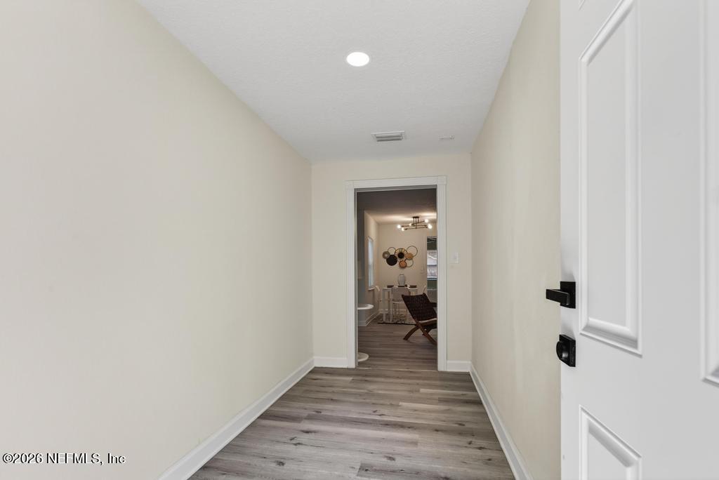 433 Lena Street St. Augustine, FL 32084 - Photo 36 of 42 a view of a room with wooden floor