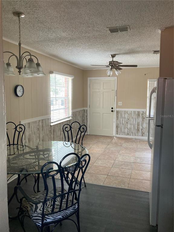 1306 Golconda Road Lakeland, FL 33801 - Photo 4 of 13 a view of a dining room with furniture