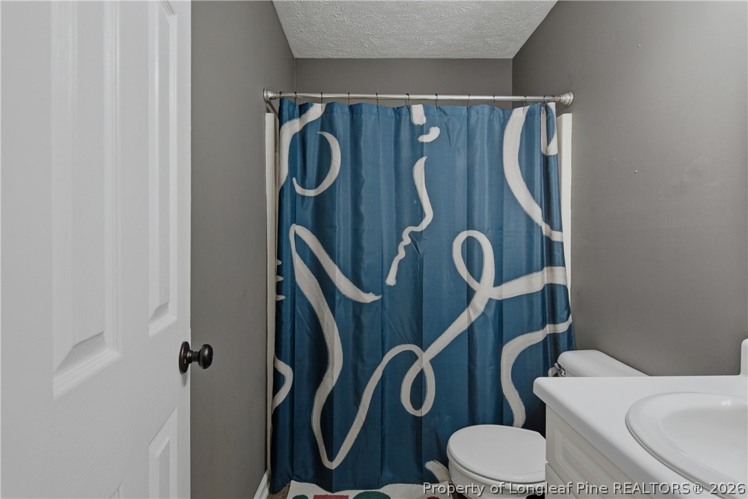 2130 Hull Road Fayetteville, NC 28303 - Photo 26 of 32 Upstairs hall bath