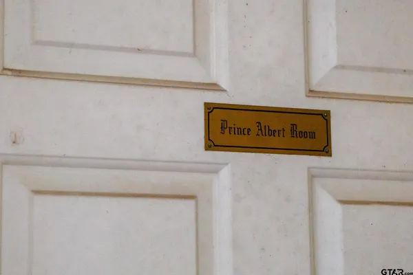 a picture of a table and a chandelier fan
