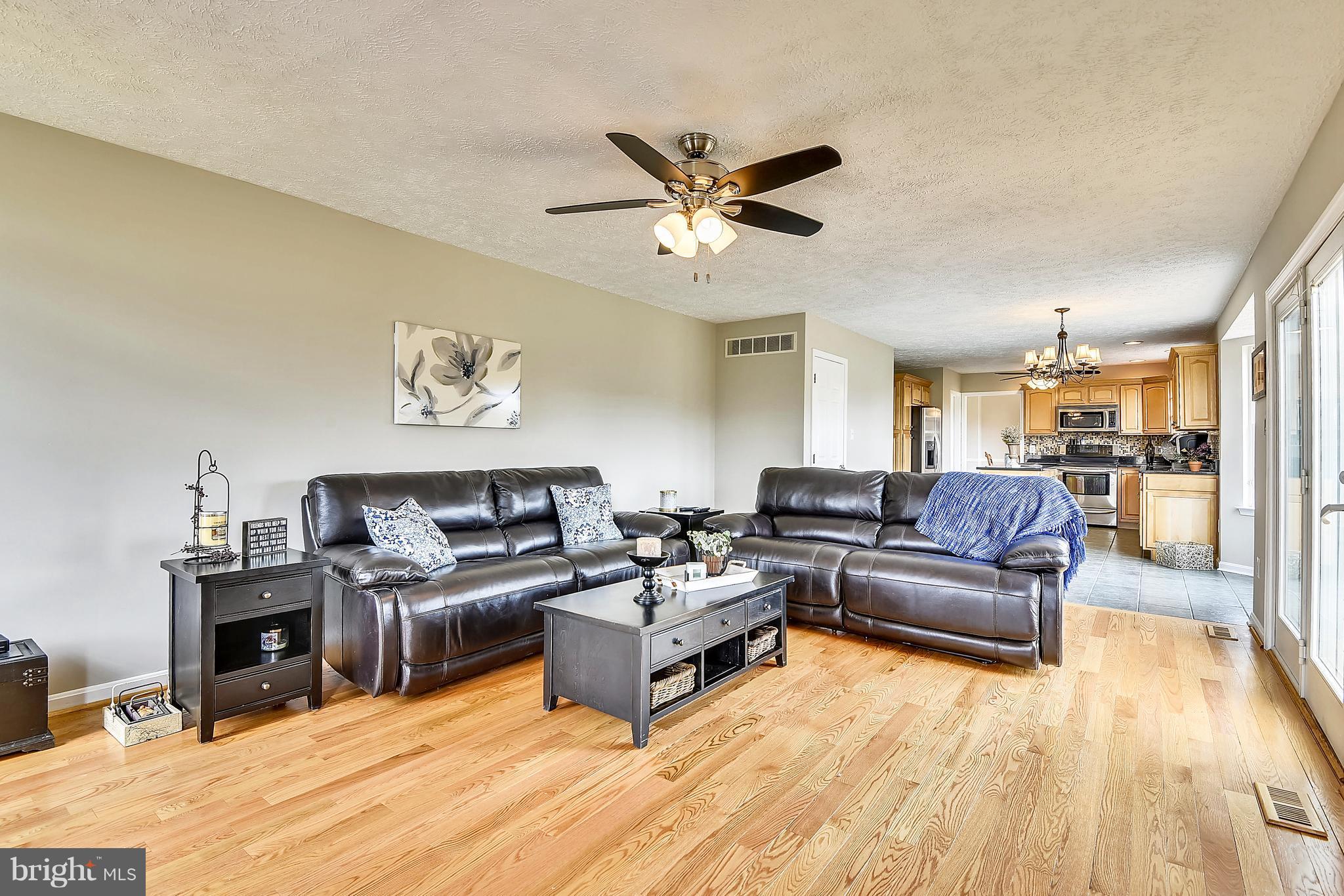 5184 Meadows Farm Road Lothian, MD 20711 - Photo 8 of 30 Family Room w/newly finished hardwood floors