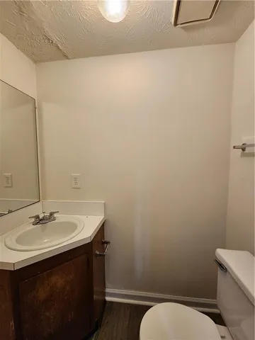 a bathroom with a sink and a toilet