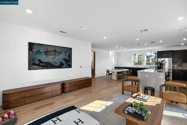 a bedroom with a bed and a night stand