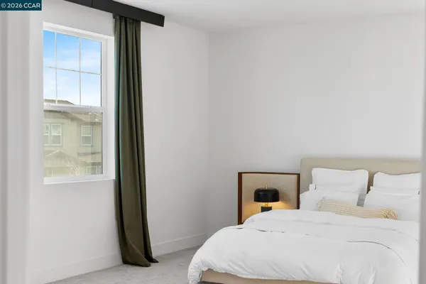 a spacious bathroom with a granite countertop tub sink and mirror