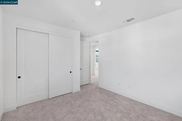a bathroom with a bathtub and a toilet