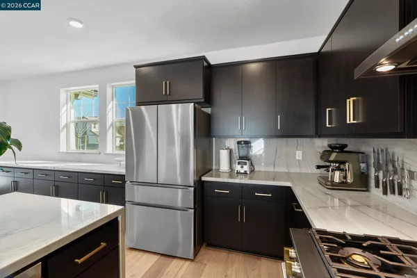 a kitchen with a sink and a window
