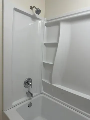 a bathroom with a bathtub