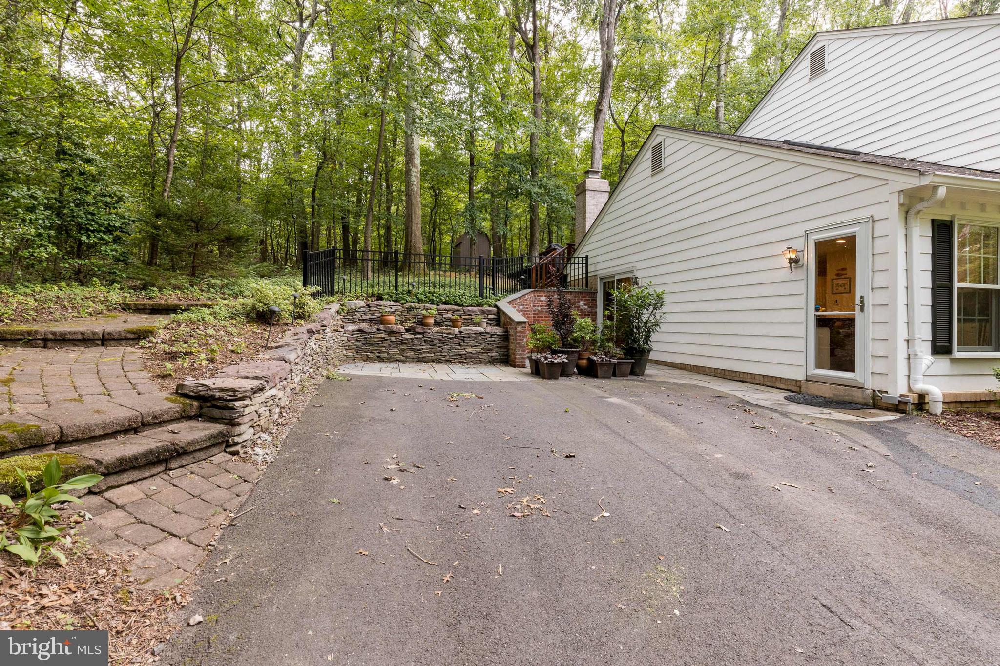 11323 Myrtle Lane Reston, VA 20191 - Photo 5 of 43 Slate patio outside the kitchen and family room