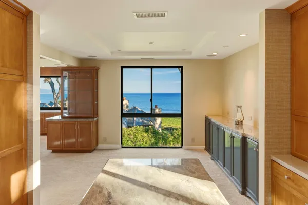 a bathroom with a double vanity sink mirror and toilet