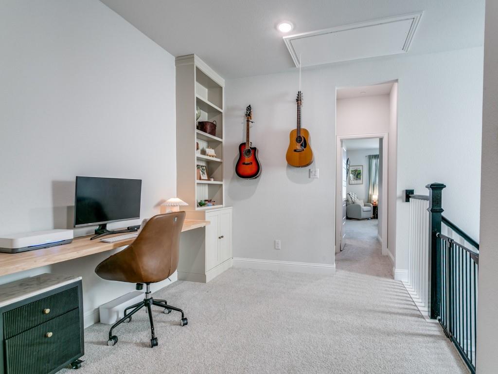 12964 Rockham Lane Dallas, TX 75234 - Photo 17 of 24 a view of a workspace with furniture