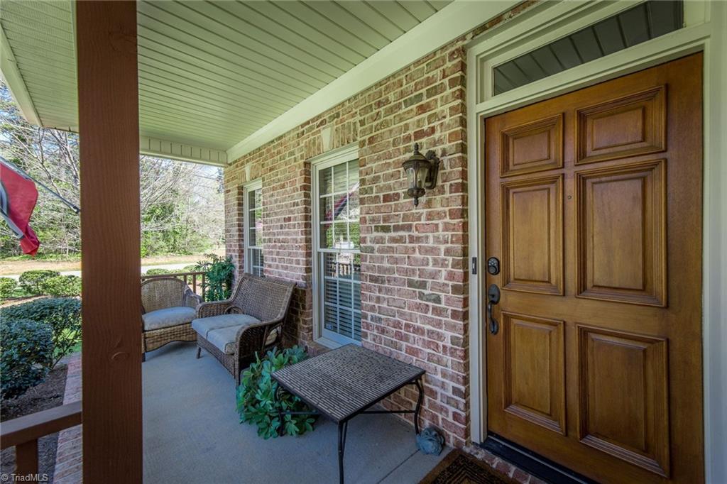 5909 Ballinger Road, Unit A Greensboro, NC 27410 - Photo 3 of 41 Front Entrance and porch large enough to feature two couches