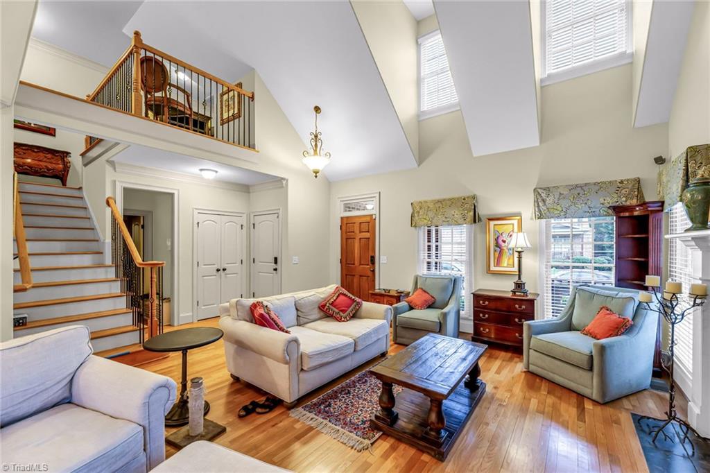 5909 Ballinger Road, Unit A Greensboro, NC 27410 - Photo 7 of 41 Great Room with view of second floor loft