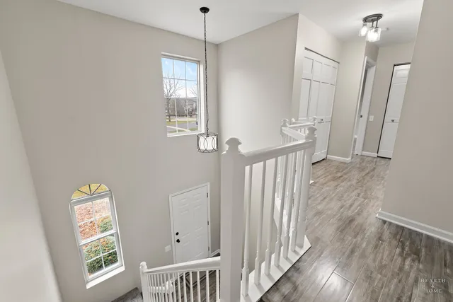 a view of entryway with wooden floor