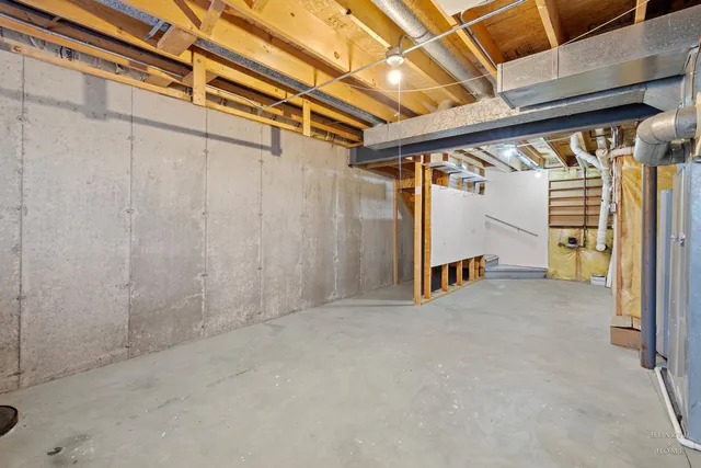 a view of a room with wooden walls