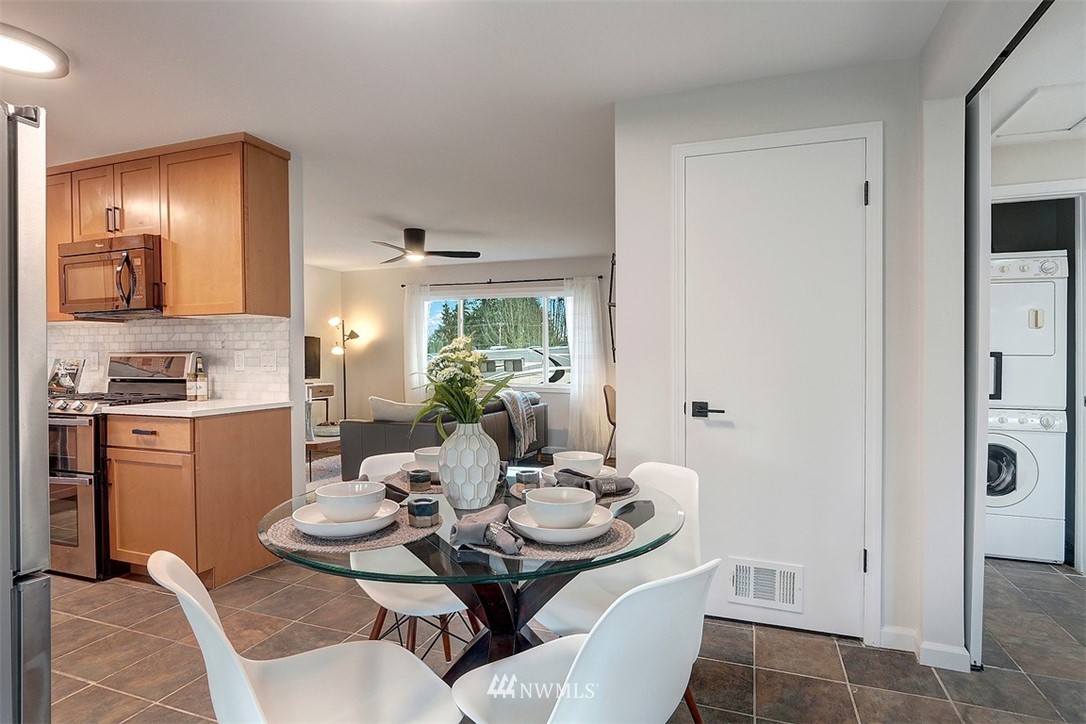 3708 Northeast 22nd Street Renton, WA 98056 - Photo 7 of 20 a dining room with furniture and window