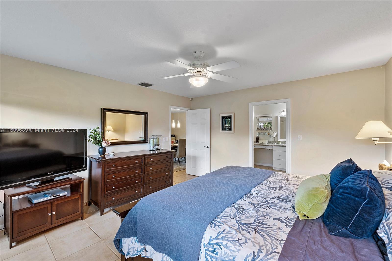 5511 Southwest 196th Lane Southwest Ranches, FL 33332 - Photo 22 of 94 a living room with furniture and a flat screen tv