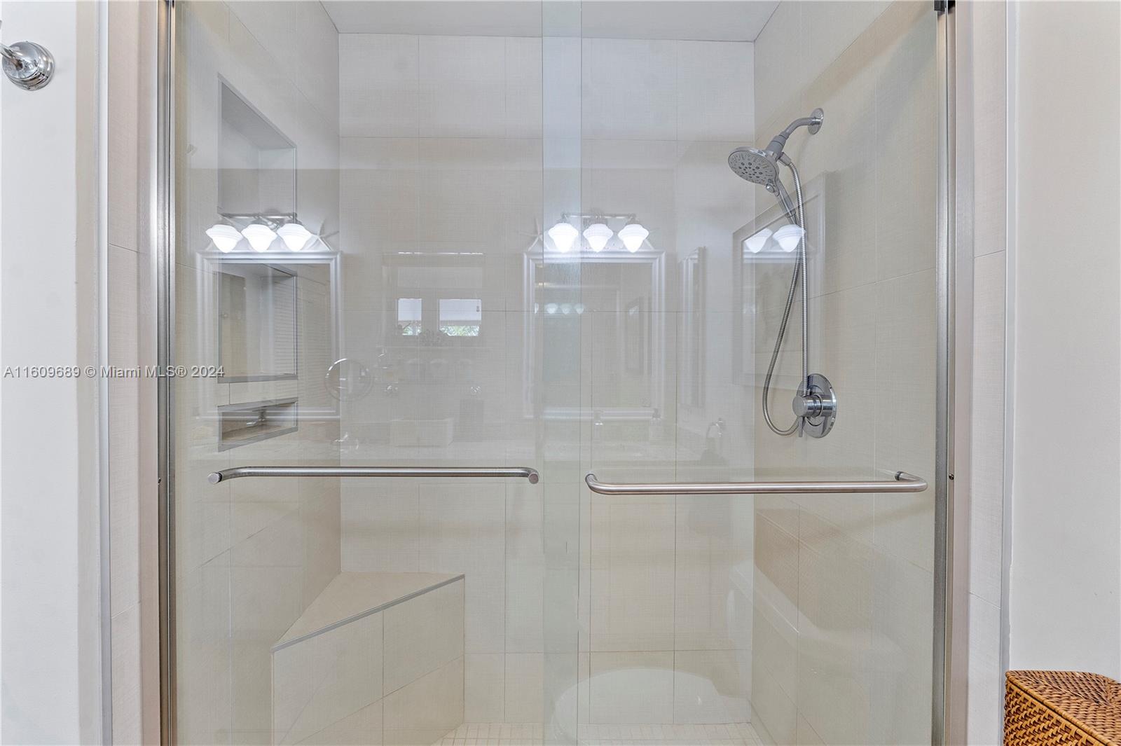 5511 Southwest 196th Lane Southwest Ranches, FL 33332 - Photo 27 of 94 a bathroom with a light fixture and a shower
