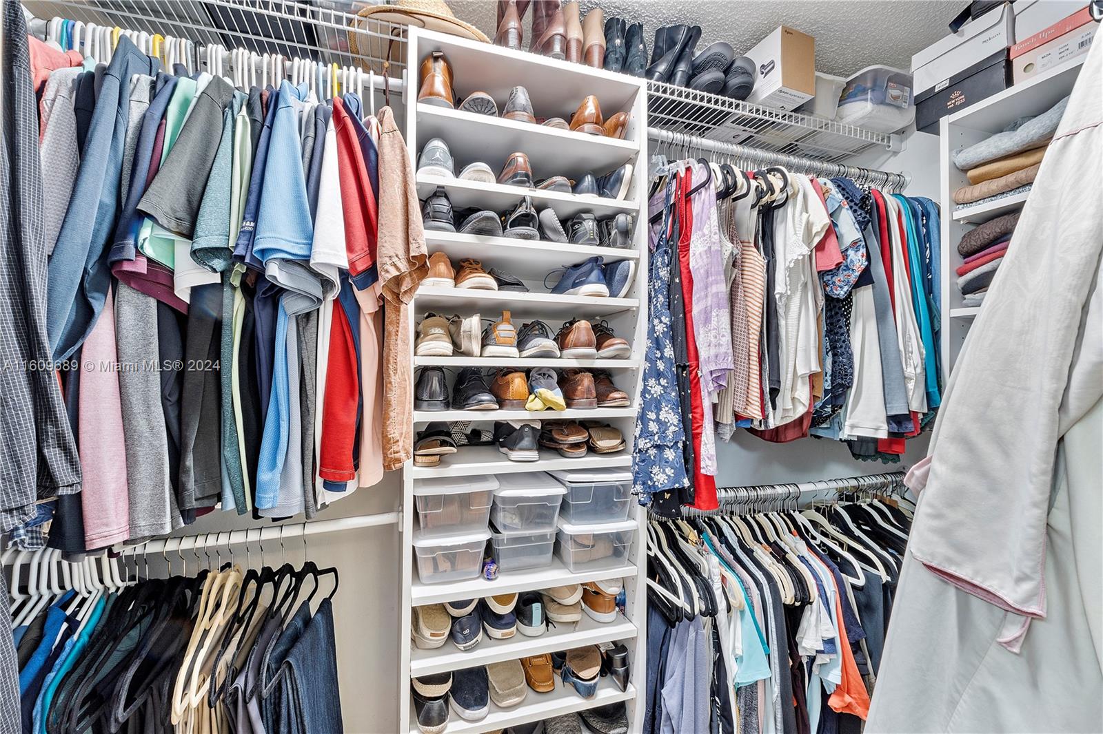 5511 Southwest 196th Lane Southwest Ranches, FL 33332 - Photo 29 of 94 a view of walk in closet with clothes and shoes