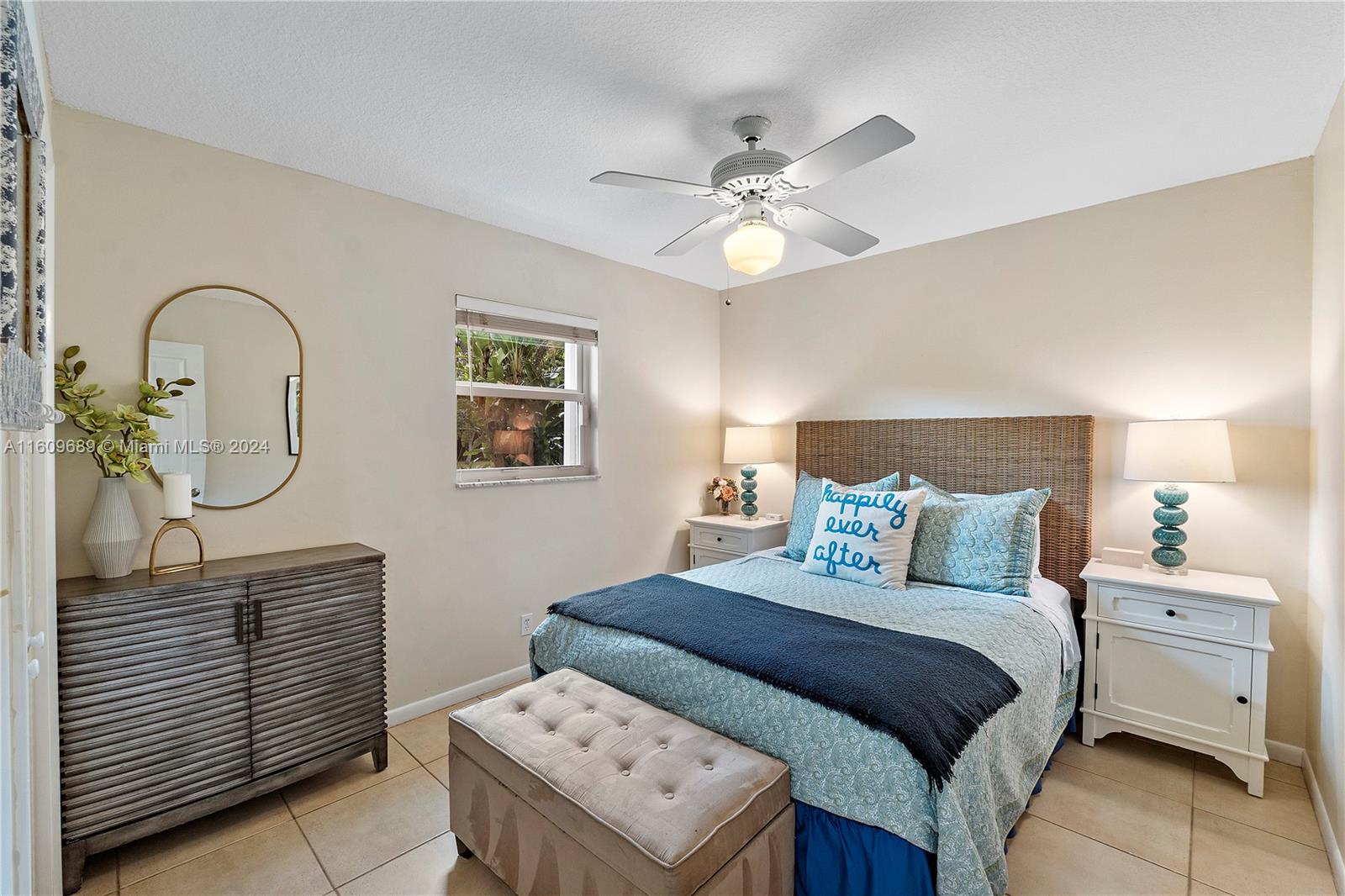 5511 Southwest 196th Lane Southwest Ranches, FL 33332 - Photo 31 of 94 a bedroom with a bed and a chandelier