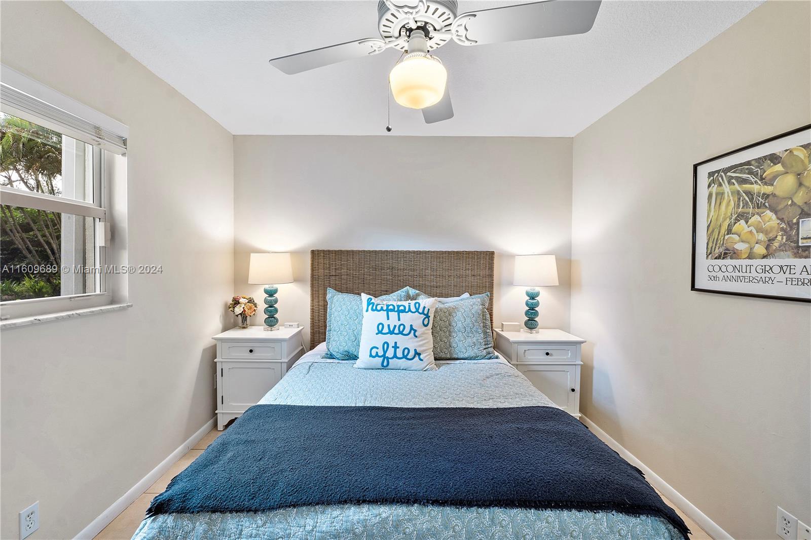 5511 Southwest 196th Lane Southwest Ranches, FL 33332 - Photo 32 of 94 a bed room with a bed mirror and wall painting