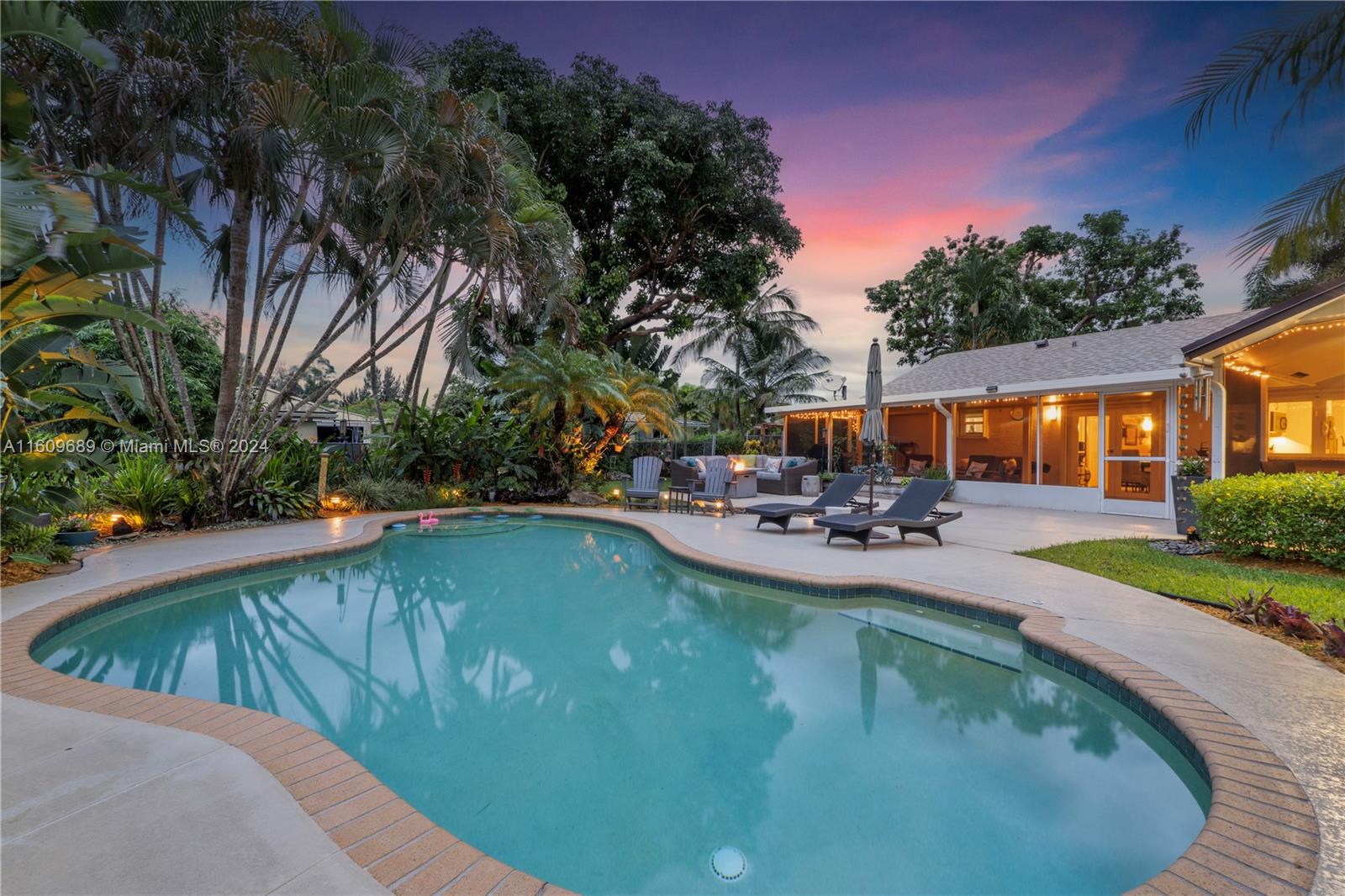 5511 Southwest 196th Lane Southwest Ranches, FL 33332 - Photo 68 of 94 a view of swimming pool with outdoor seating and plants
