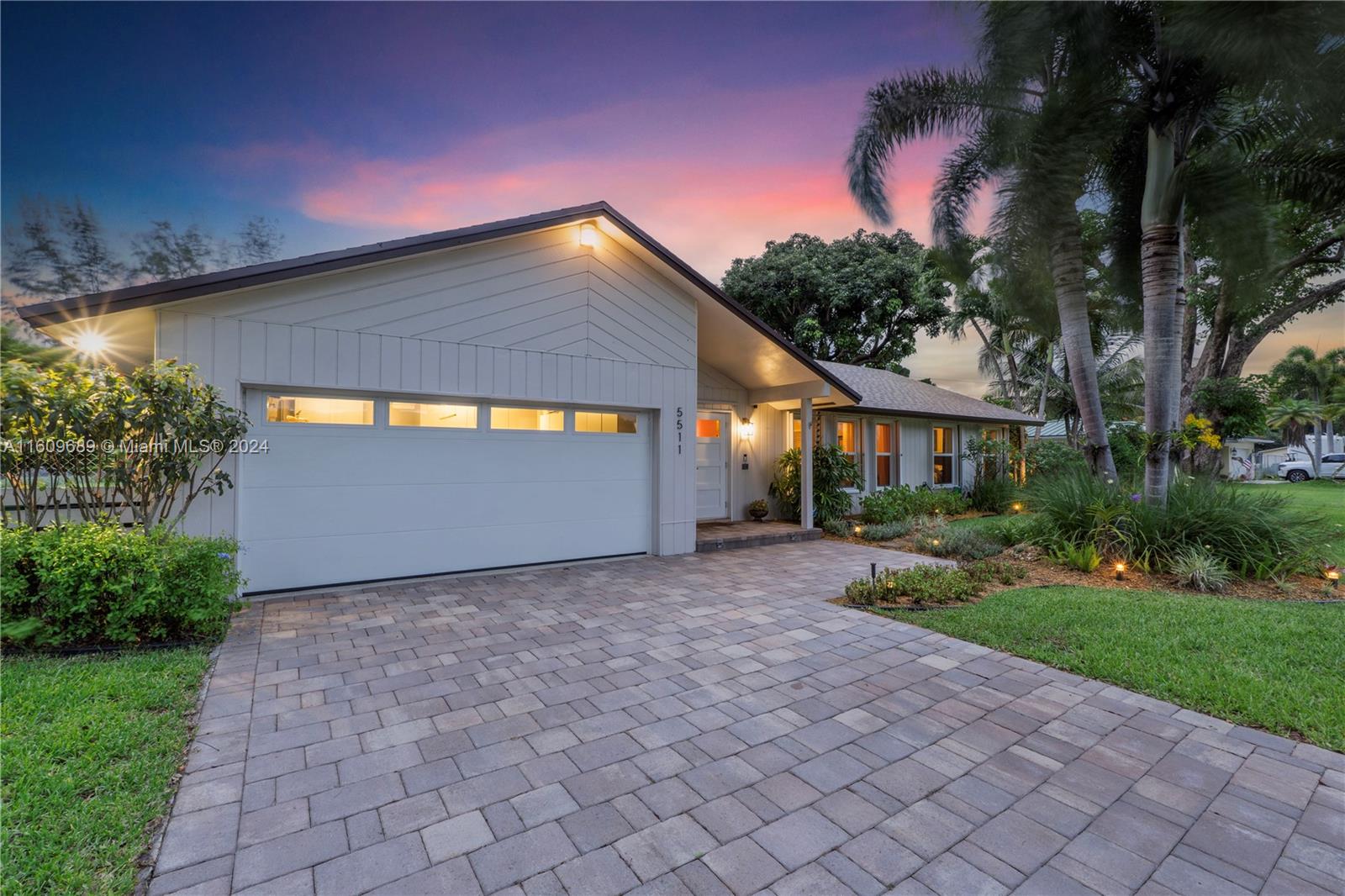 5511 Southwest 196th Lane Southwest Ranches, FL 33332 - Photo 75 of 94 a view of a house with a yard