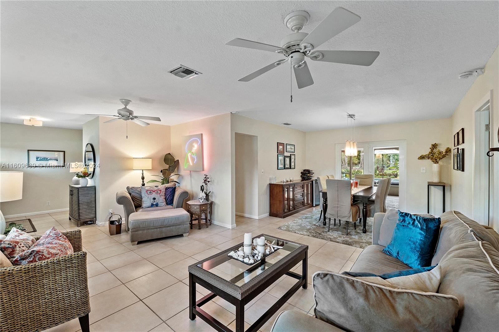 5511 Southwest 196th Lane Southwest Ranches, FL 33332 - Photo 8 of 94 a living room with furniture and a wooden floor