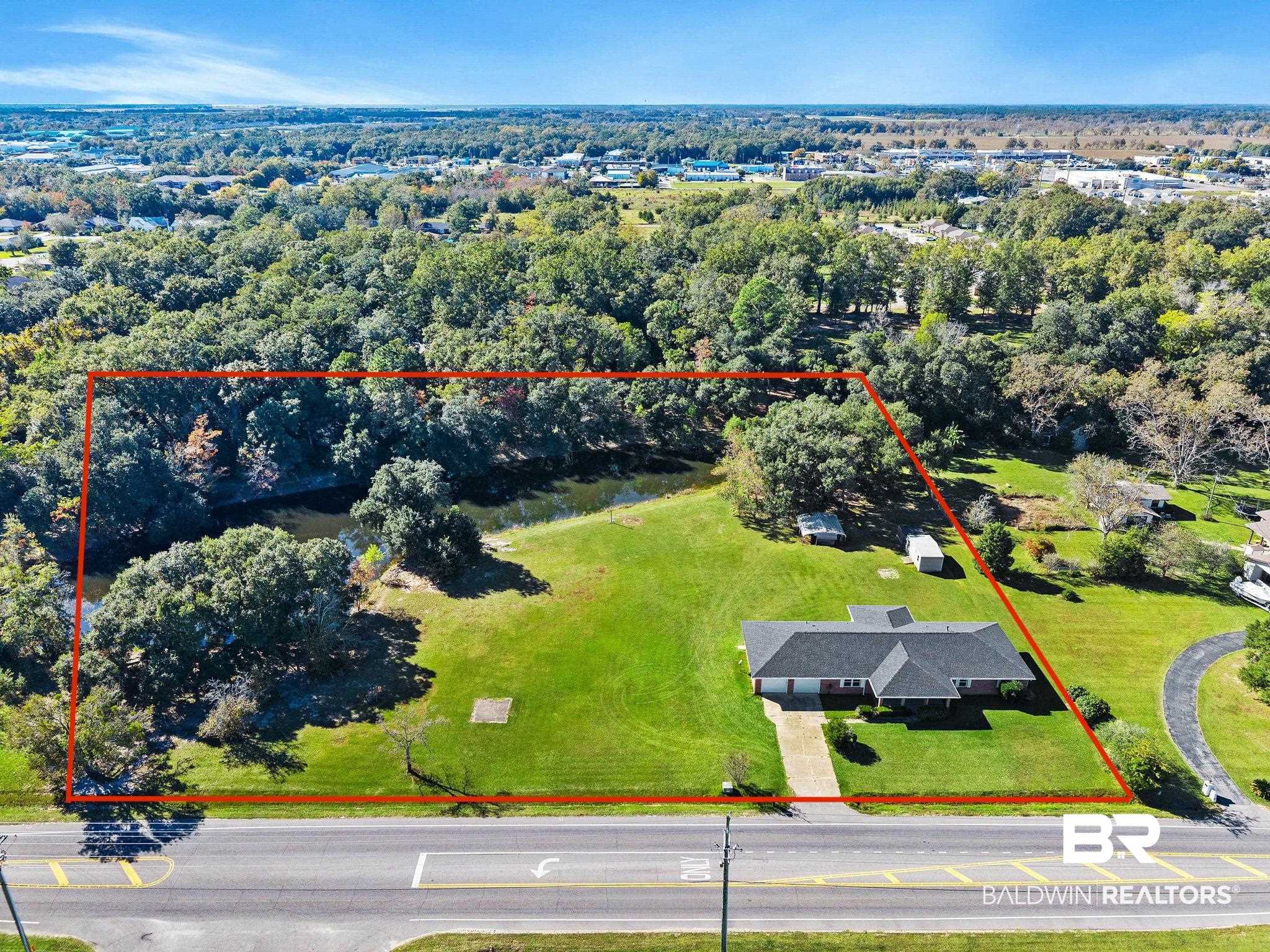 1510 South Juniper Street Foley, AL 36535 - Photo 4 of 36 Aerial overview of property's location with property parcel outlined