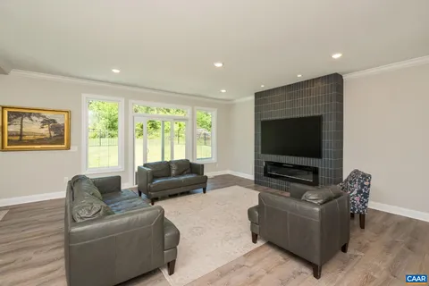 a kitchen with stainless steel appliances a stove microwave and a sink
