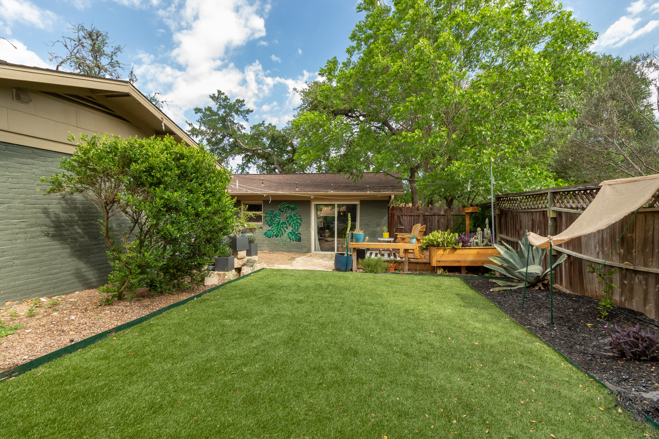 2809 Rae Dell Avenue Austin, TX 78704 - Photo 20 of 34 Yard has artificial turf