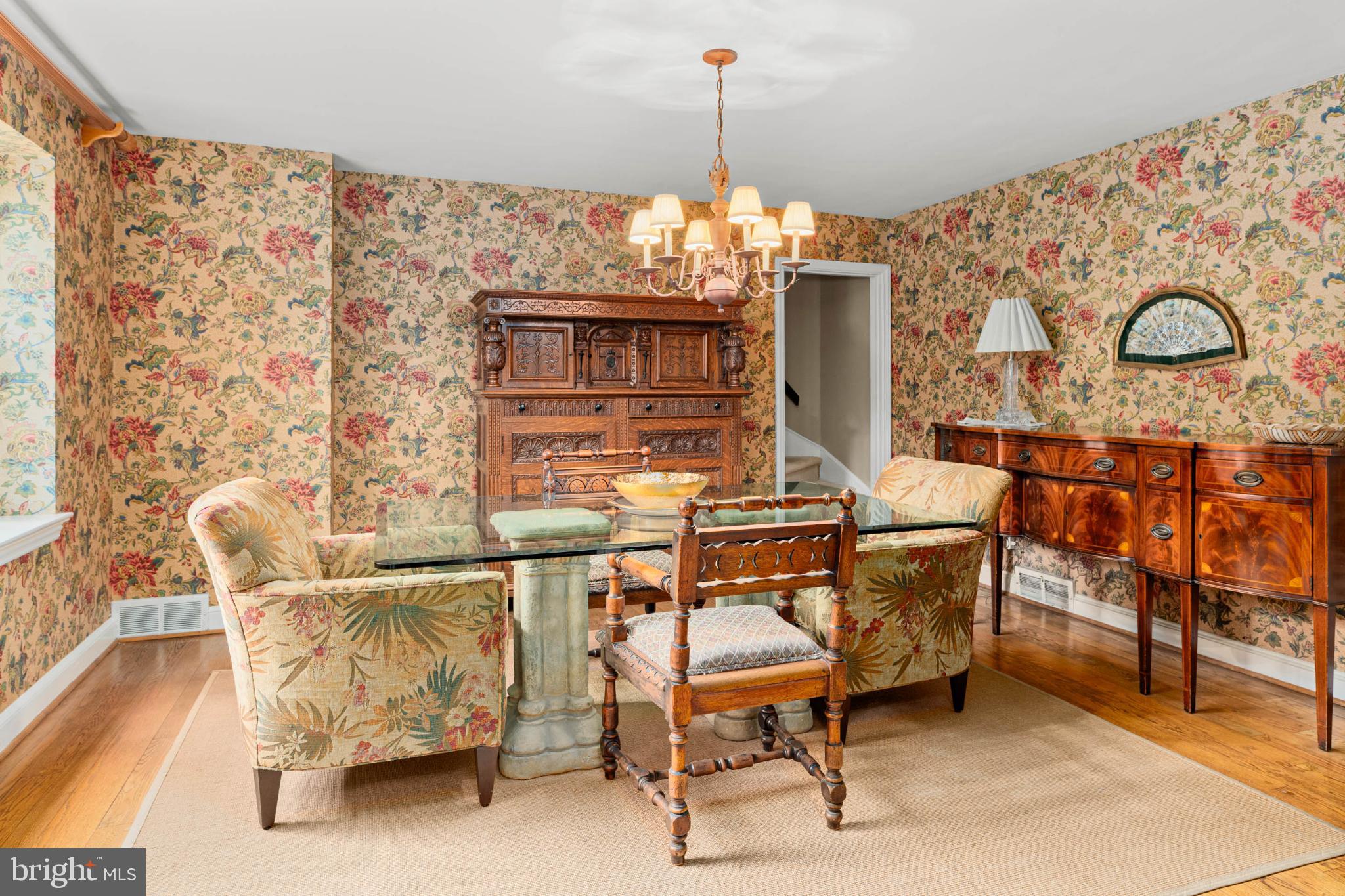 407 Fairview Road Penn Valley, PA 19072 - Photo 12 of 59 Dining room with floral accents and back stairs.