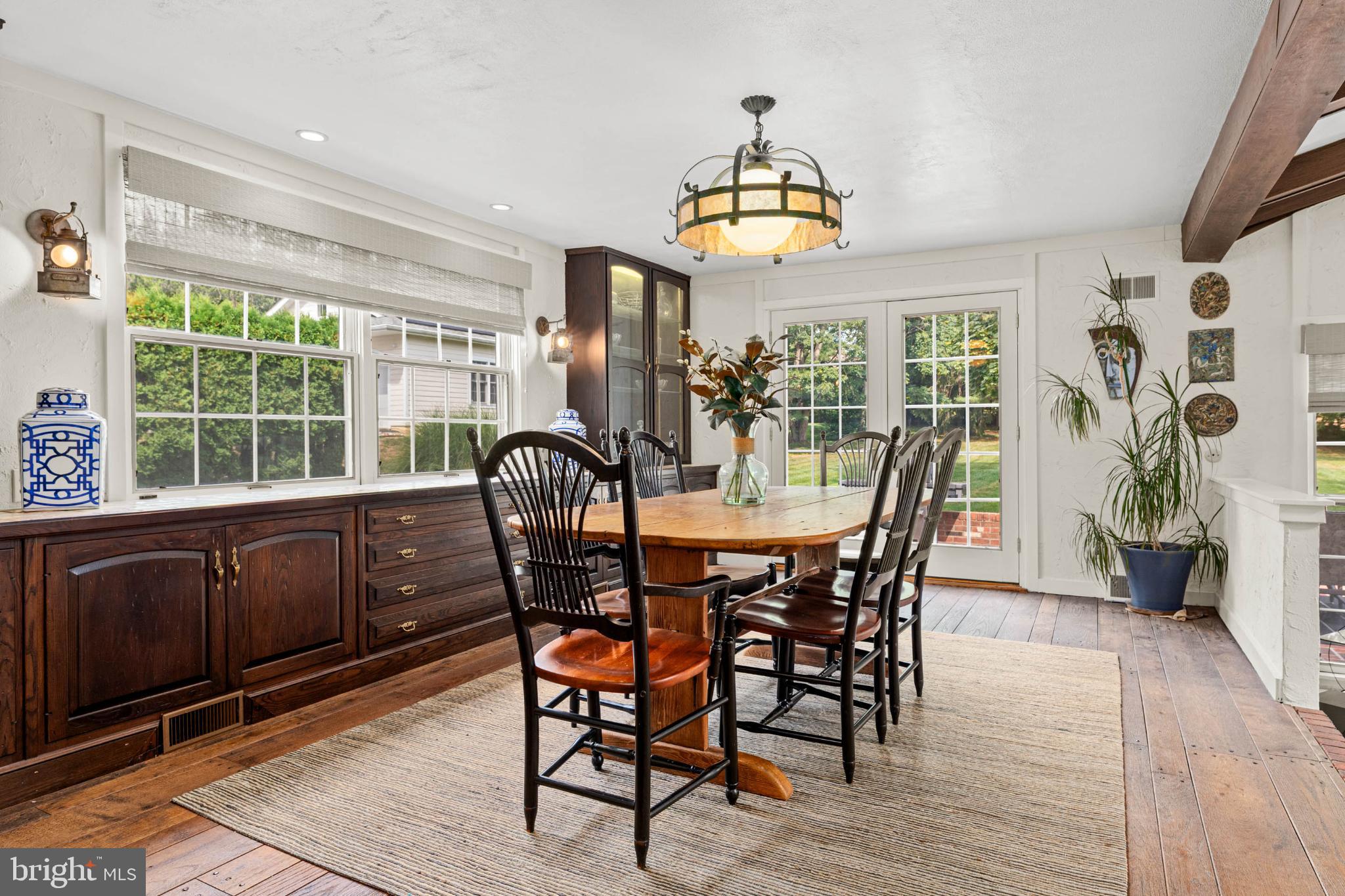 407 Fairview Road Penn Valley, PA 19072 - Photo 19 of 59 Large, informal dining space exits to brick patio.