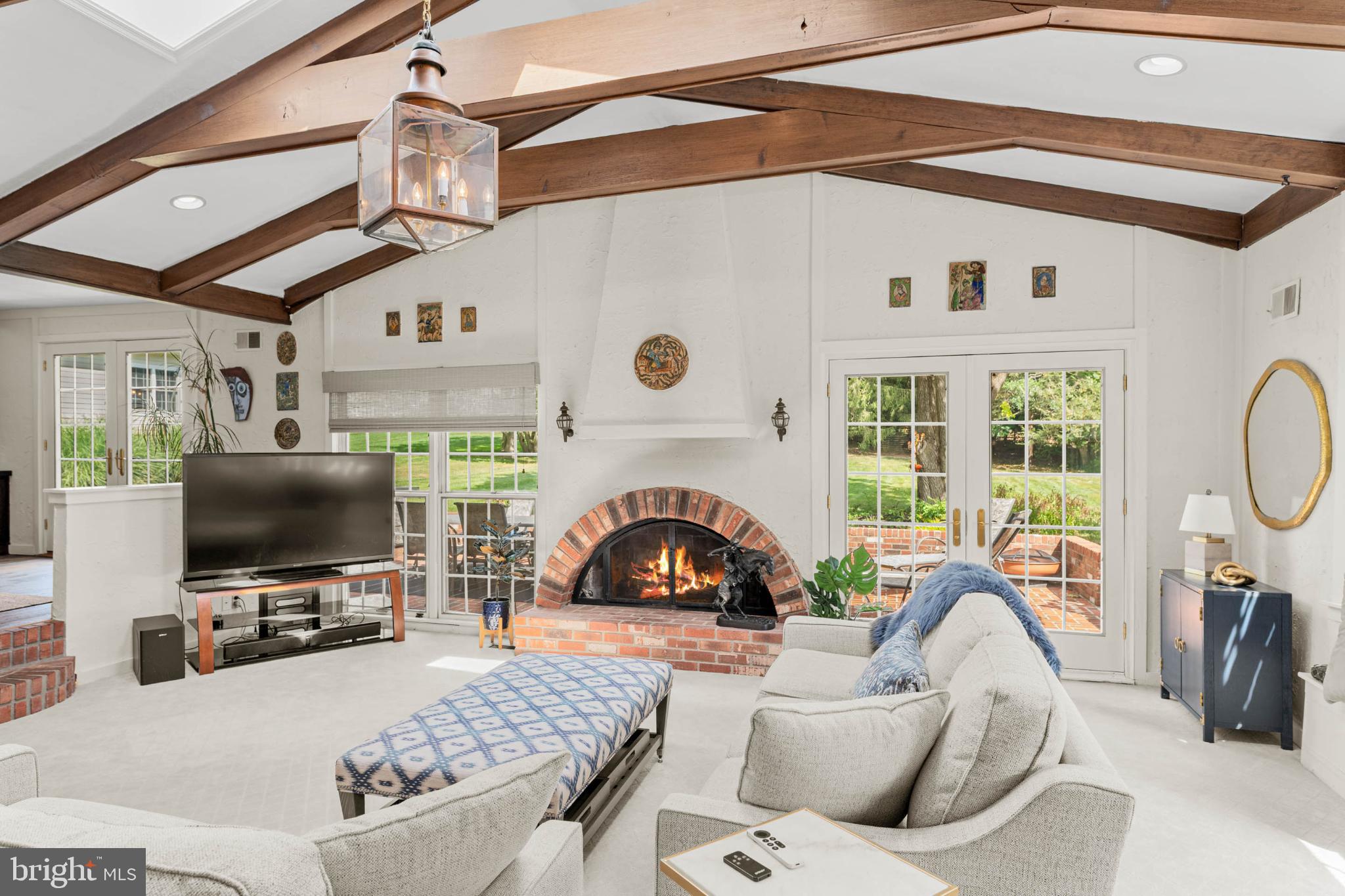 407 Fairview Road Penn Valley, PA 19072 - Photo 21 of 59 Family room off kitchen w/rustic lighting & charm.