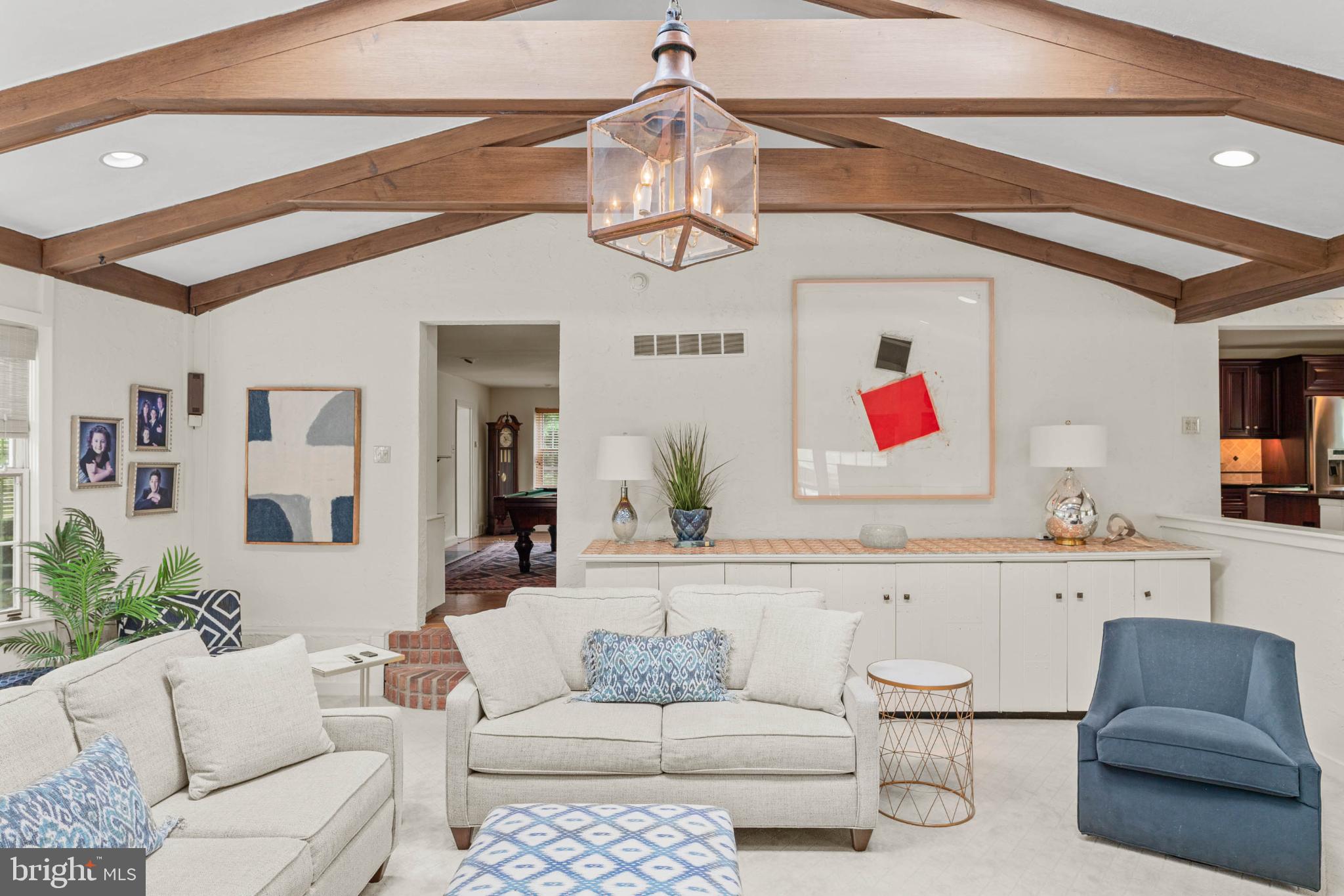 407 Fairview Road Penn Valley, PA 19072 - Photo 26 of 59 Grand high-ceiling living space with rustic beams.