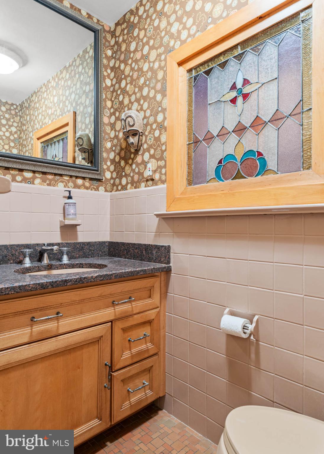 407 Fairview Road Penn Valley, PA 19072 - Photo 27 of 59 Charming powder room with stained glass accents.