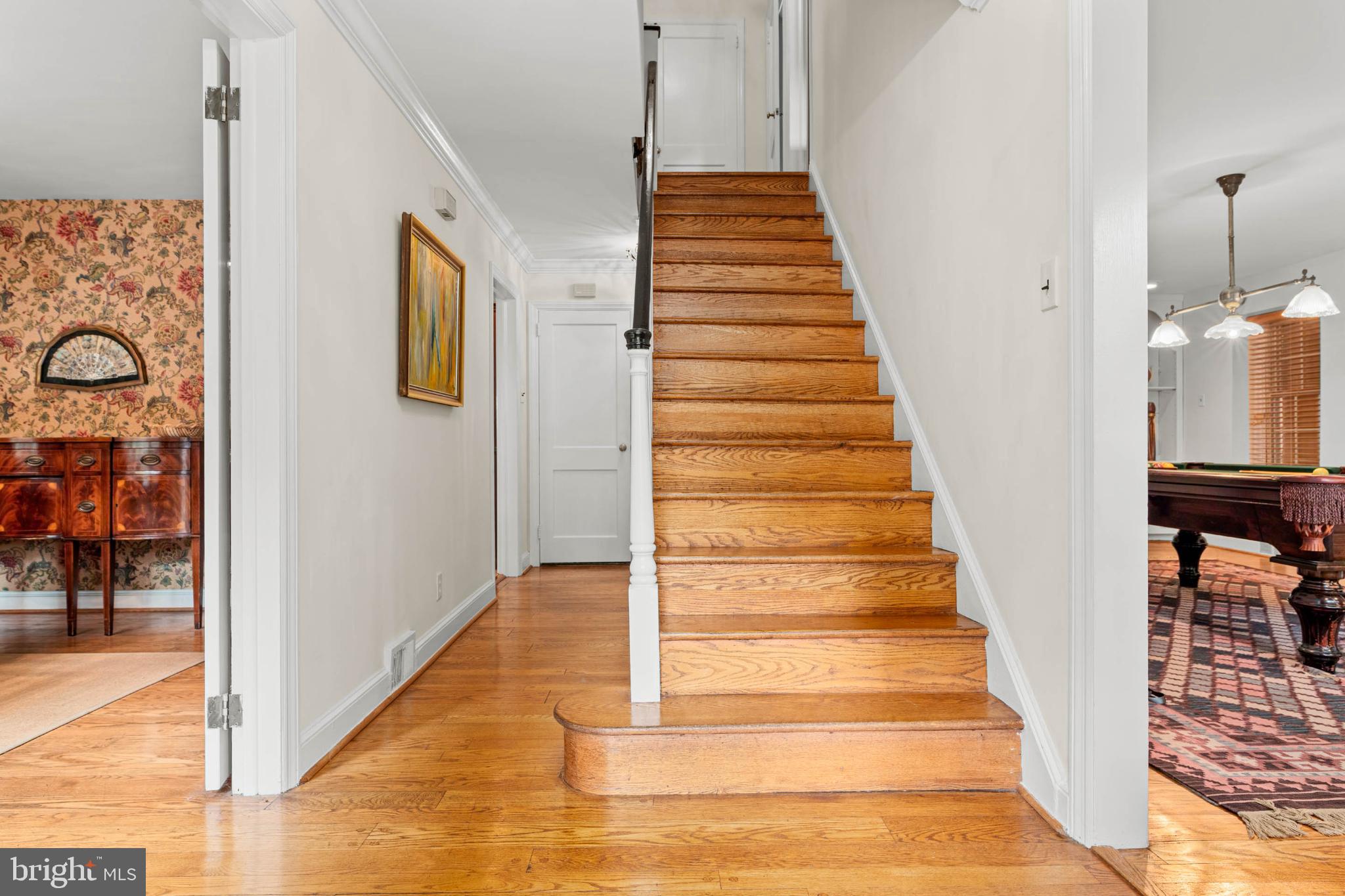 407 Fairview Road Penn Valley, PA 19072 - Photo 28 of 59 Center foyer w/inviting staircase & HW floors.